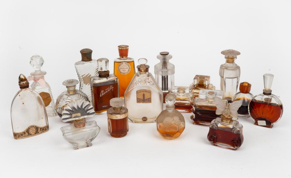 Auction comp thumbnail for Eighteen assorted vintage and antique glass perfume bottles including butterfly stopper example, the largest 13cm high (Leski Auctions Pty Ltd, Lot 473)