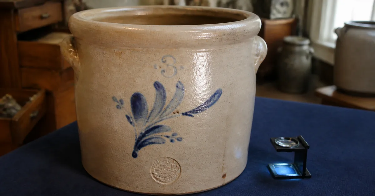 Antique stoneware crocks with cobalt decoration and stamped maker markings Antique stoneware crocks with cobalt decoration and stamped maker markings