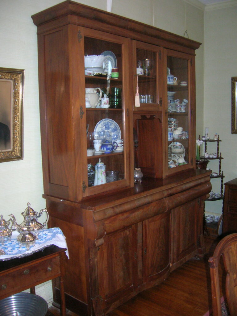 A Victorian American Made Solid Wood Oak China Cabinet From circa early 20th Century