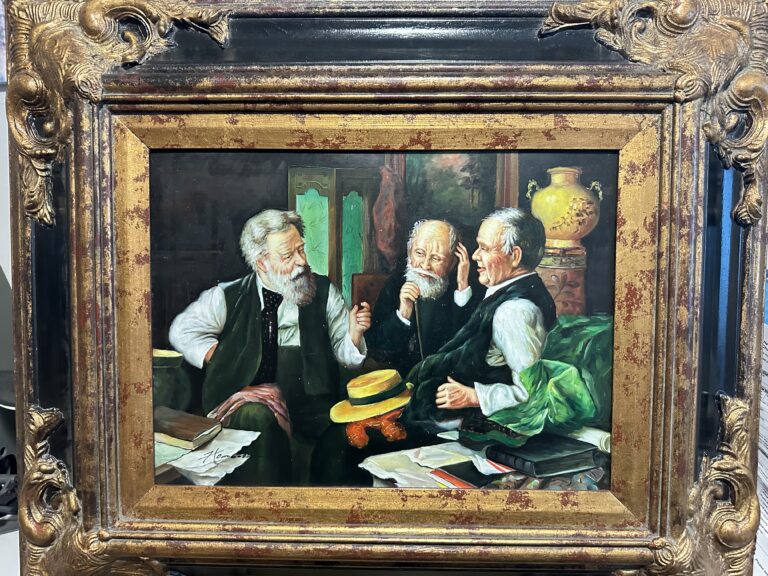 Painting titled “The Good Old Days” by Listed Artist LLouis Charles Moeller (5 August 1855 – 1930, was an American genre painter). The artwork is a vivid oil painting, rich in detail and color, depicting three elderly men engaged in what appears to be a moment of contemplative discussion or decision-making. The painterly style suggests realism, with a focus on capturing the nuanced expressions and interactions between the figures. The characters are rendered with lifelike textures and folds in their clothing, highlighting the artist’s skill in portraying the varied textures of fabric, hair, and skin. Earthy tones and controlled use of lighting contribute to the intimate atmosphere and emphasize the subjects’ faces, drawing the viewer’s attention to their emotional gravity. The cluttered table with papers suggests intellectual or administrative activity, possibly in a domestic or informal business setting.